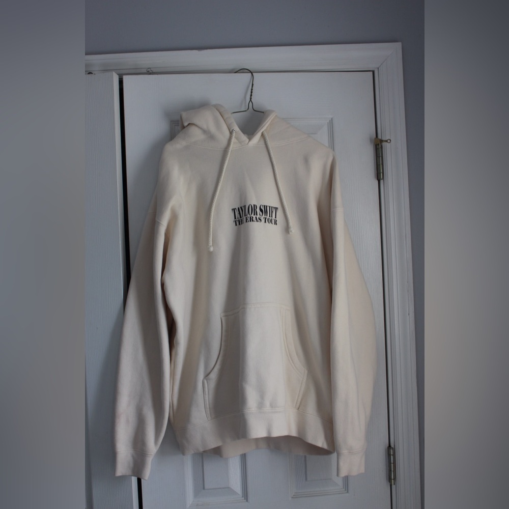 Taylor Swift Eras Tour Cream Pullover Hoodie with Black Chest Logo